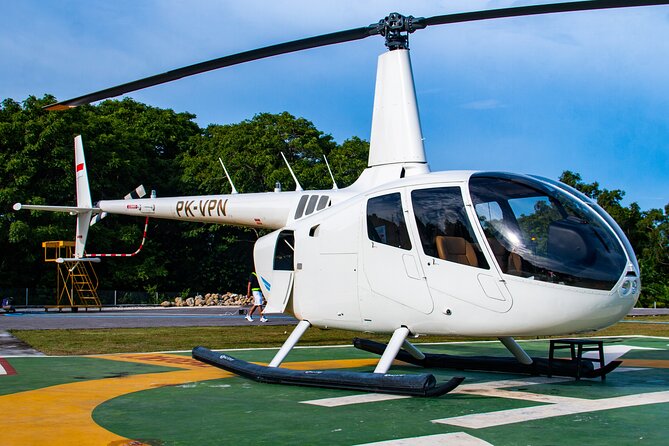 Above the Island of Gods Helicopter Tour - Uluwatu Temple above the Indian Ocean