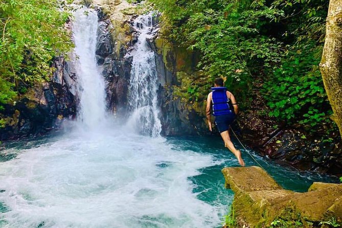 All Inclusive : Jumping Sliding at Aling- Aling Waterfall - Handara Gate - Lunch - Private transport makes a long day easier