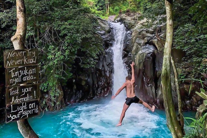 All Inclusive : Jumping Sliding at Aling- Aling Waterfall - Handara Gate - Lunch - The difference between a thrilling jump and a bad idea