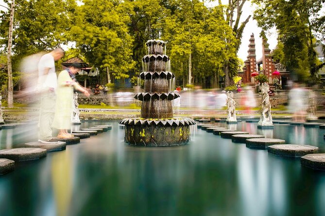 All Inclusives Bali Private Tour Temples Palaces and Nature - Tirta Gangga’s water, stone, and mountain setting