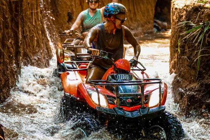 ATV Quad Bike Bali with Gorilla Cave & Lunch at Cretya Sunset - Through rice fields, jungle paths, and muddy valleys