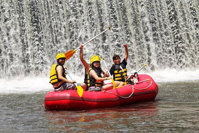 Atv Ride and White Water Rafting Adventures - Rafting past cliffs, mountains, and waterfalls