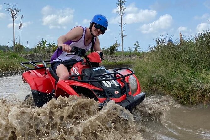 Bali : ATV Quad Bike and White Water Rafting Adventure with Lunch - Riding an ATV through mud, jungle, and the Gorilla Tunnel