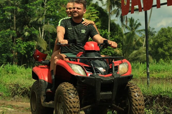 Bali ATV Quad Bike with Ubud Day Tour All Inclusive - Cooling off at Tegenungan Waterfall