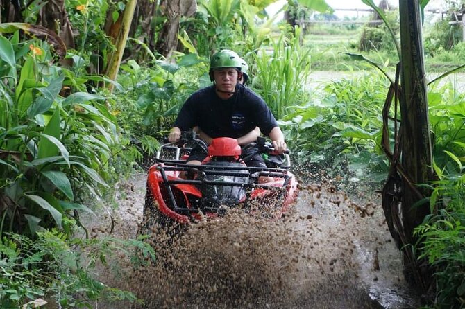 Bali ATV Quadbike Through Gorilla Face Cave - Into jungle, mud, and river crossings