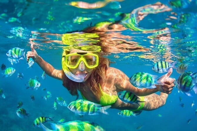 Bali Blue Lagoon Snorkeling Tour All Inclusive - Boarding the traditional boat at Padang Bai