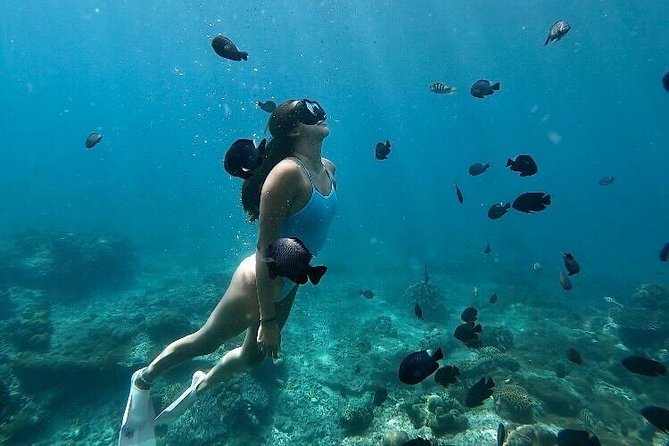 Bali Blue Lagoon Snorkeling with Optional Tour & Activities - Entering the Blue Lagoon by boat