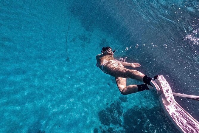Bali Blue Lagoon Snorkeling with Optional Tour & Activities - Two snorkeling spots and the guide’s role