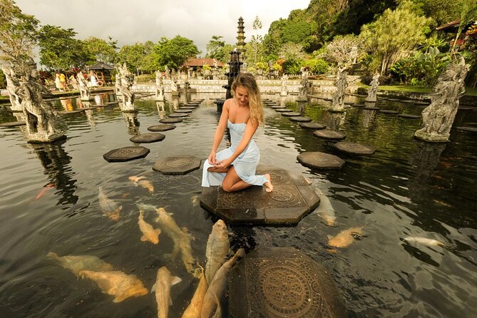 Bali Instagram Tour: Gate of Heaven, Swing and Waterfall Day Tour - Tukad Cepung Waterfall through jungle and cave