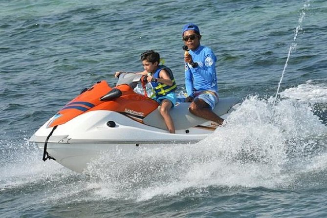 Bali Parasailing Adventure,Banana Boat,Jet Ski and Donut Boat with Transfers - Parasailing over the Nusa Dua water