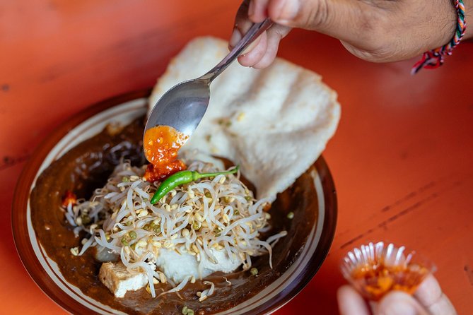Bali Private Food Walking Tour With Locals: The 10 Tastings - The royal palace stop and a small naming detail