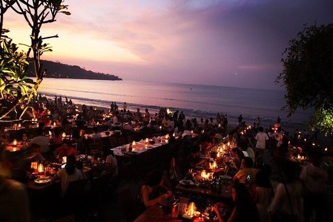Bali Romantic Seafood Dinner under sunset jimbaran Beach - Sunset, city lights, and the crowded shoreline