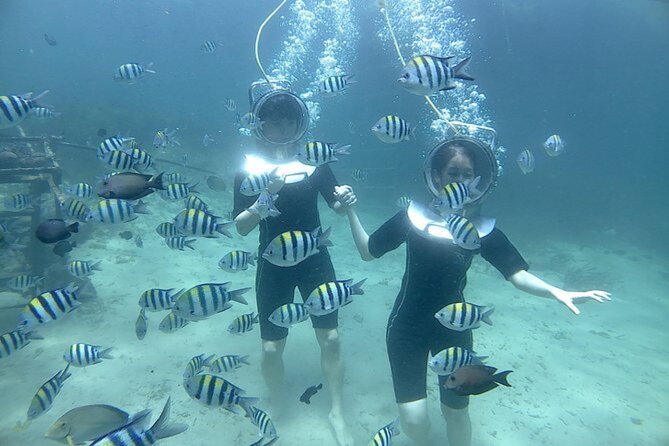 Bali Sea Walker Under Water Experience With Hotel Transfer - Putting on the helmet and heading below