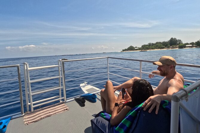 Gili Hai 3 Islands BBQ Cruise - Swimming above Gili Meno’s underwater statues