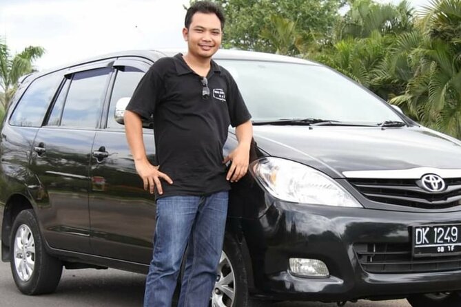 Individual Private Car Hire with English Speaking Chauffeur - Ubud’s temples, market, and green walks