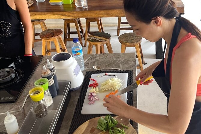 Learn to cook Indonesian food at Gili Cooking Classes Trawangan - The open-air harbor setting has pros and cons