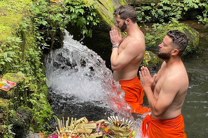 Melukat Purification Ceremony at Mengening Temple - Learning from the guide before the water ceremony