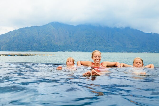 Mount Batur Sunrise Jeep Tour with Hot Springs and Waterfall - Cooling off at Tibumana Waterfall