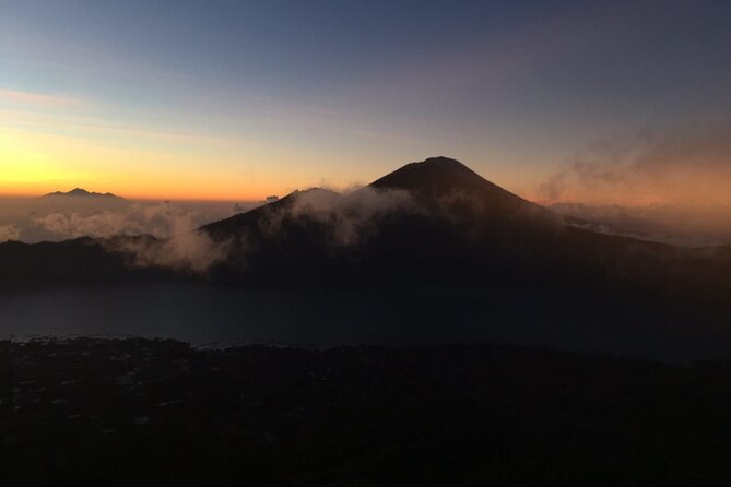 Mount Batur Sunrise Trekking with Breakfast - Sunrise around 6:00 am, with Mount Abang and Lake Batur below