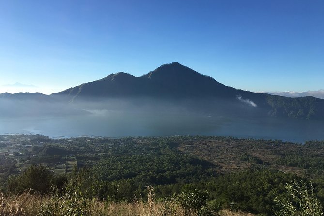 Mount Batur Sunrise Trekking With Local Guide - Sunrise above the clouds