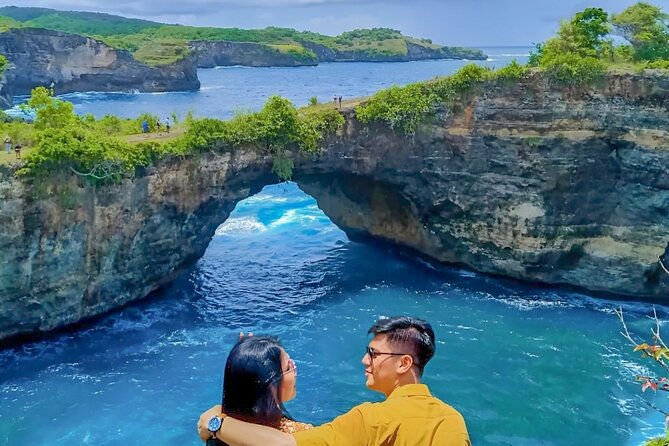Nusa Penida Day Tour Kelingking Broken and Angels Bay - Crystal Bay, palm trees, and changing conditions