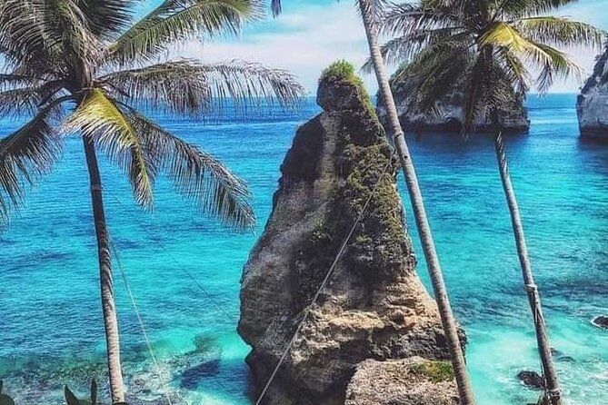 Nusa Penida East And West Full Day Private Guided Tour - Atuh Beach: clear water below high cliffs