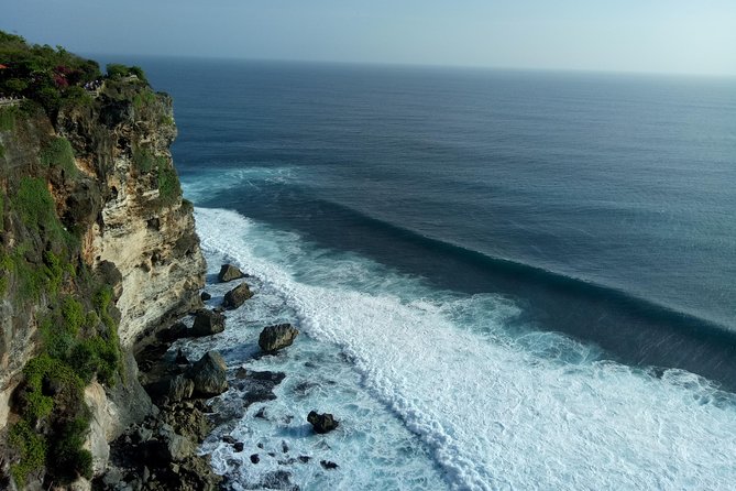 Private Tour Bali Beaches and Uluwatu Temple with Dinner - Pandawa Beach, rock carvings, and swimming time