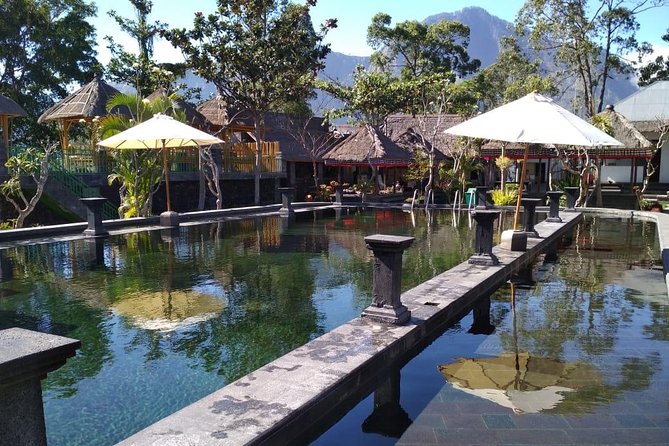 Private Tour Mount Batur Sunrise Trekking and Natural Hot Spring - Reaching Mount Batur’s 1,717-meter summit