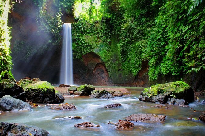Private Tour To Tibumana Waterfall, rice terraces & Jungle Swing - Puseh Batuan Temple: a strong cultural opening