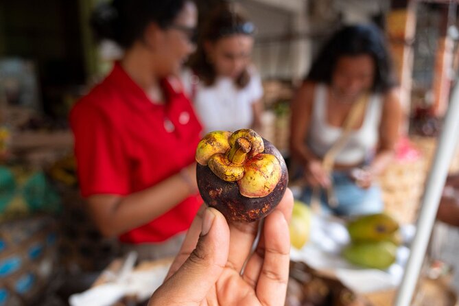 Taste & Explore Bali: Denpasar Street Food & Historic Sites - What the guides add to the experience