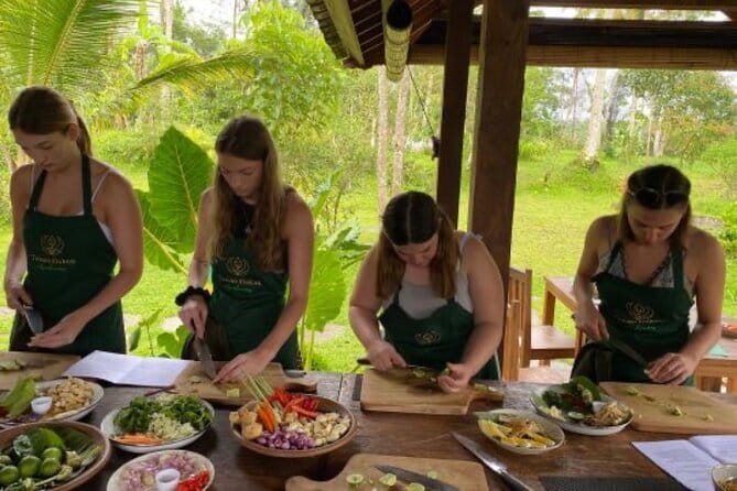 Ubud Cooking Class with Optional Market Visit Pickup Included - Eating beside the rice fields